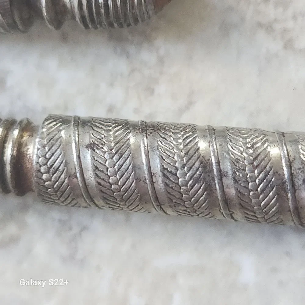 Silver metal Vintage Embossed Nutcracker & Six Picks set